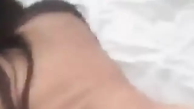 Close-up of Asian babe's ass in dog style position